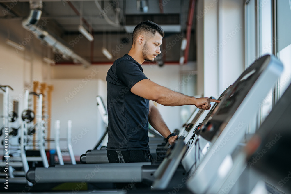 Using treadmill, adjusts speed.