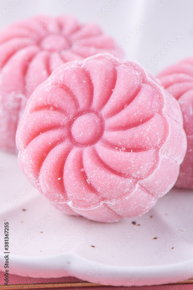 Colorful snow skin moon cake, sweet snowy mooncake, traditional savory dessert for Mid-Autumn Festiv