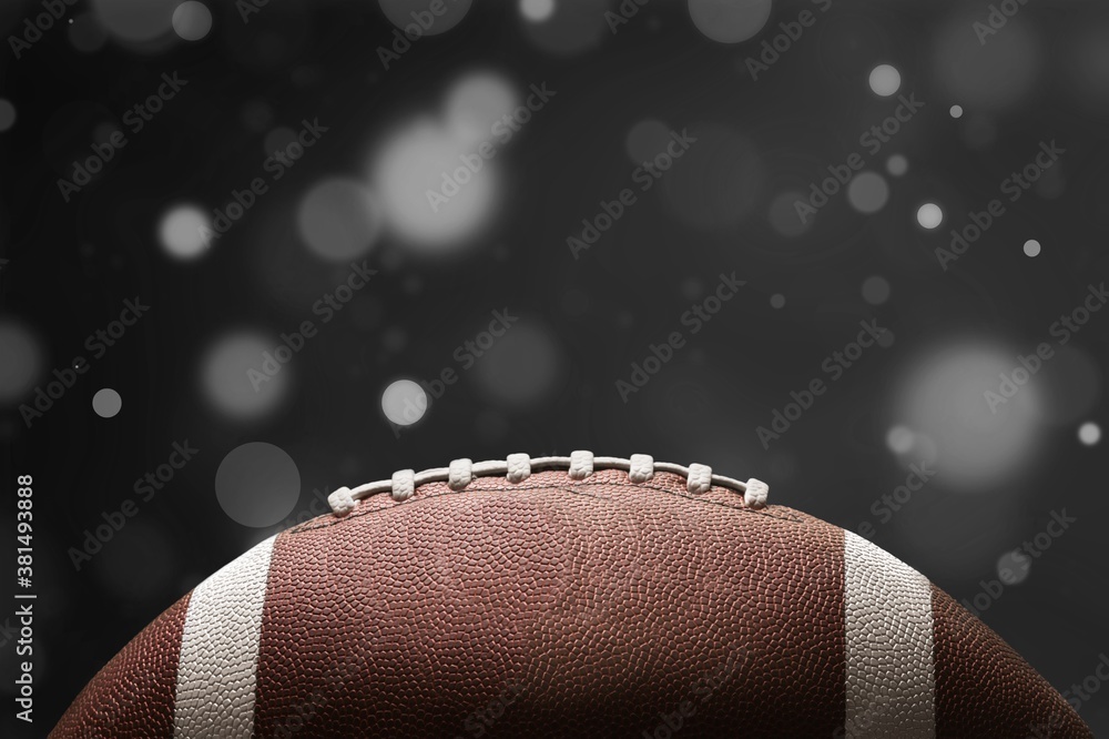 American leather football ball on background