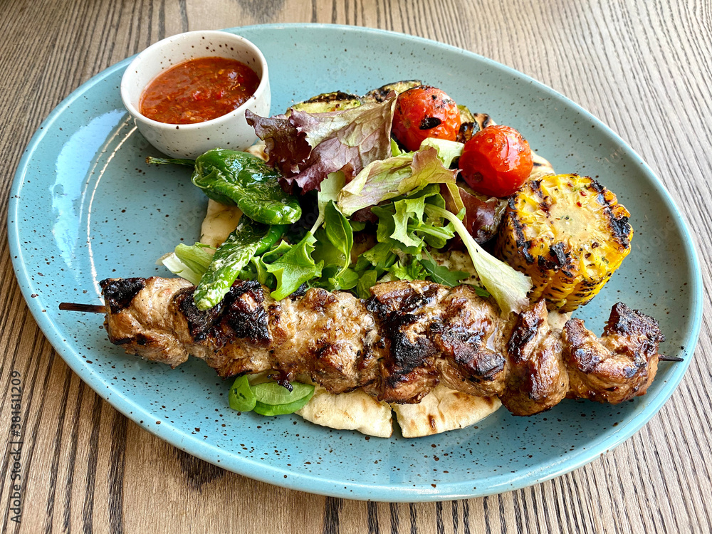 pork kebab meat on wooden skewer