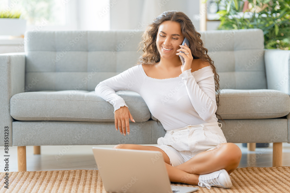 Young woman is using laptop