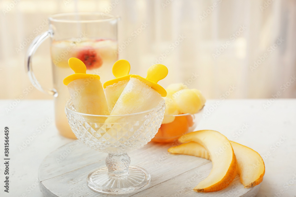 Tasty melon ice cream in bowl on table