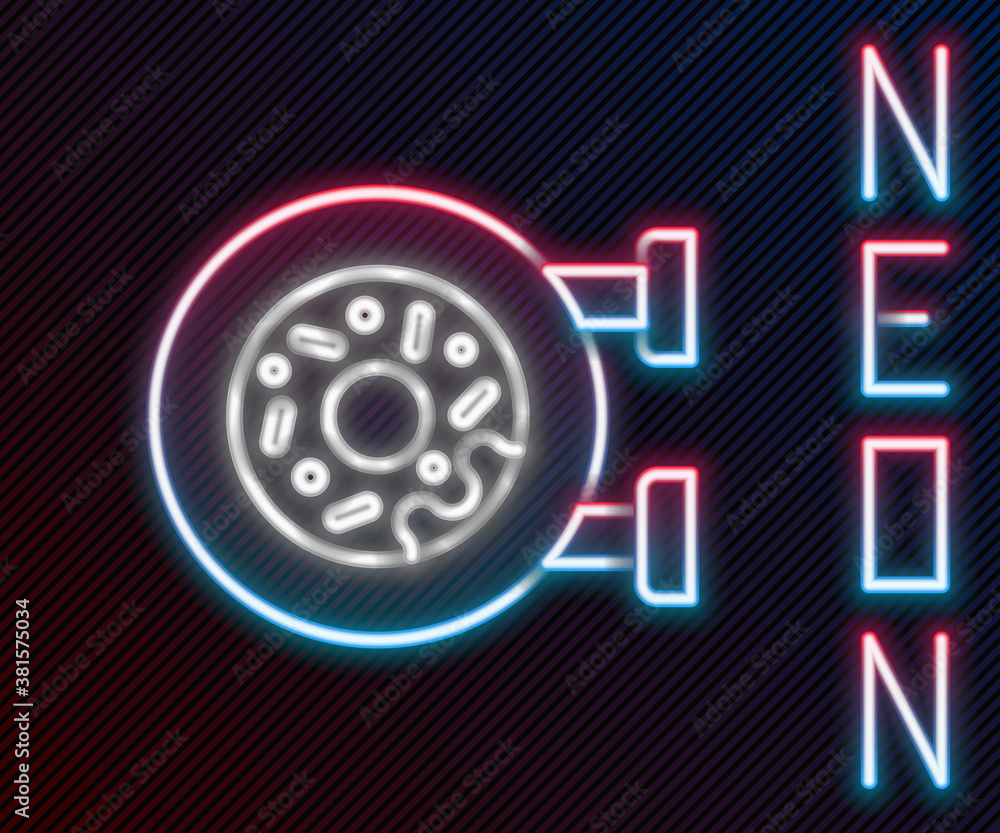 Glowing neon line Donut with sweet glaze icon isolated on black background. Colorful outline concept