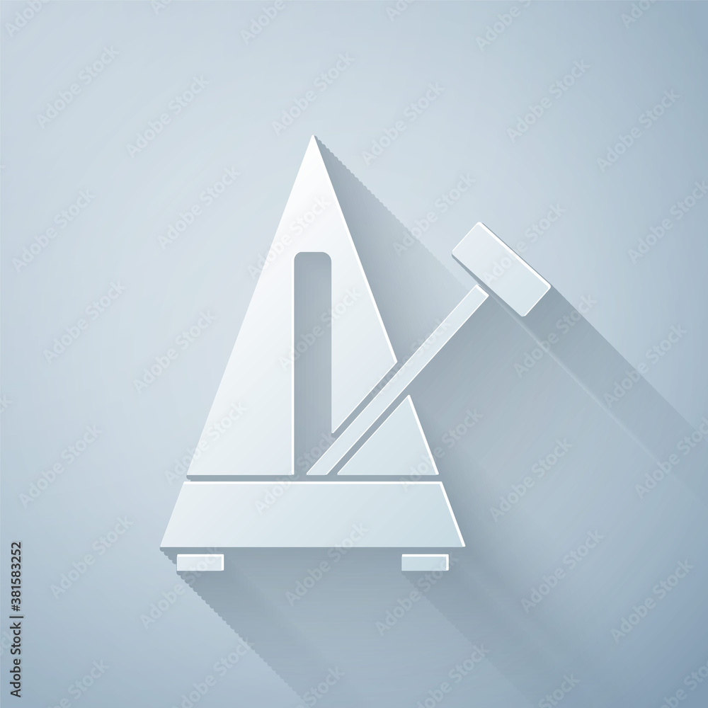 Paper cut Classic Metronome with pendulum in motion icon isolated on grey background. Equipment of m