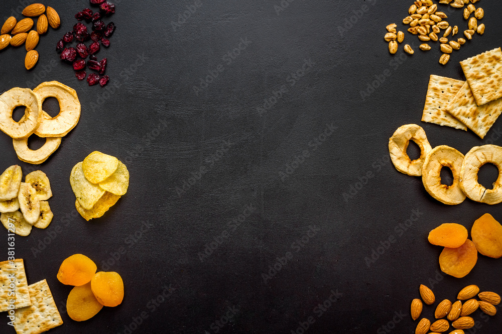 Healthy snacks for students - nuts and fruits mix top view