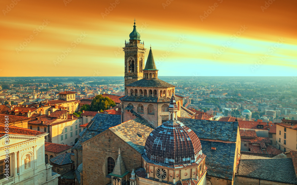 Bergamo city - Scenic sunse view of the Old city and Basilica of Santa Maria Maggiore and Cappella C