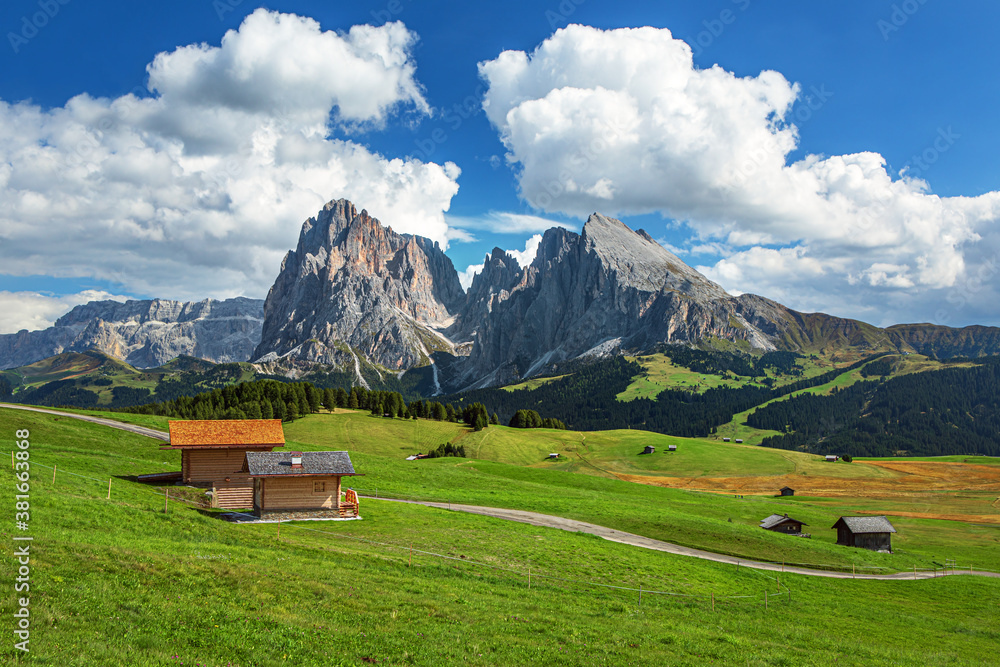 Famous Alpe di Siusi - Seiser Alm with Sassolungo - Langkofel mountain group in background at sunset