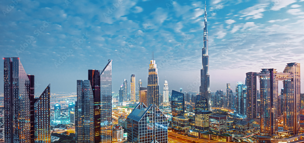 Dubai - amazing city skyline with luxury skyscrapers at sunset, United Arab Emirates