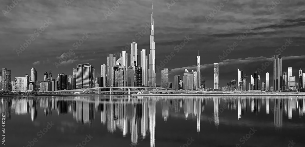 View on Dubai skyline with reflection at the sunrise, Dubai, United Arab Emirates 