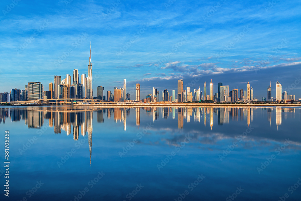 View on Dubai skyline with reflection at the sunrise, Dubai, United Arab Emirates 