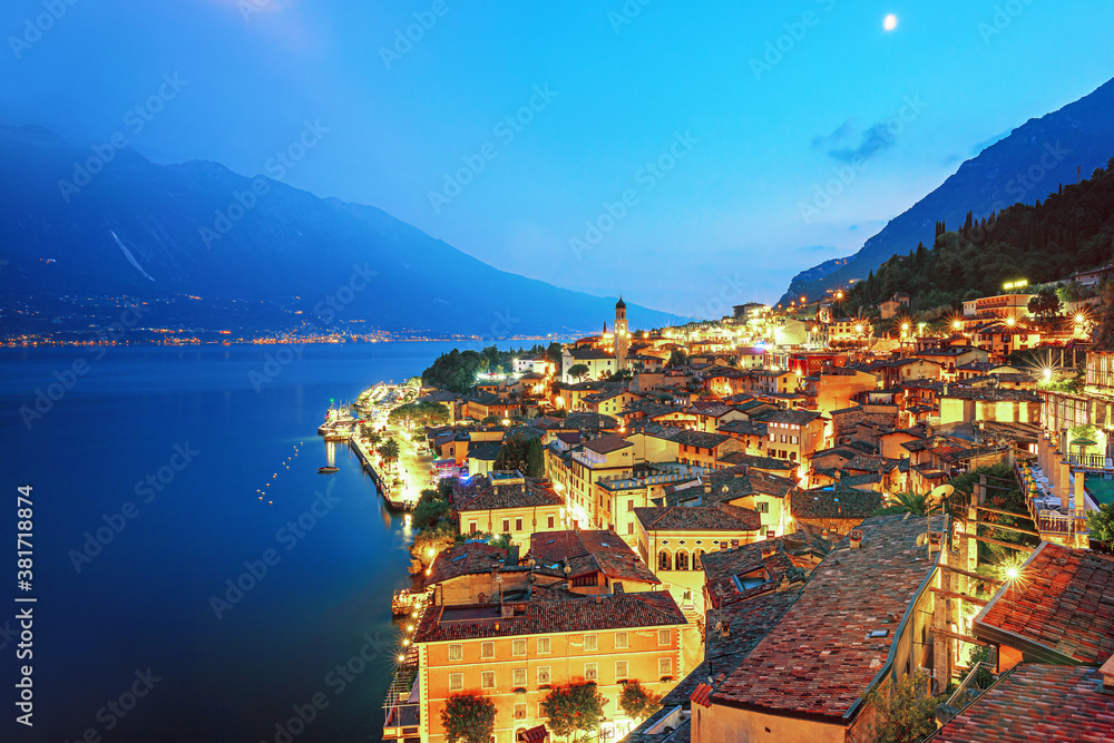 Scenic view on Lake Garda  in Limone sul Garda town, famous tourist destination in Italy