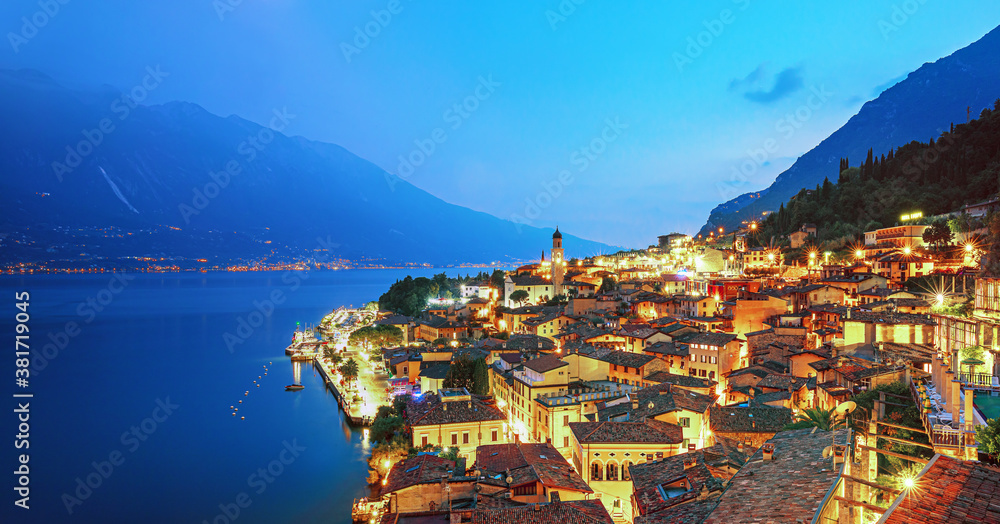 Scenic view on Lake Garda  in Limone sul Garda town, famous tourist destination in Italy