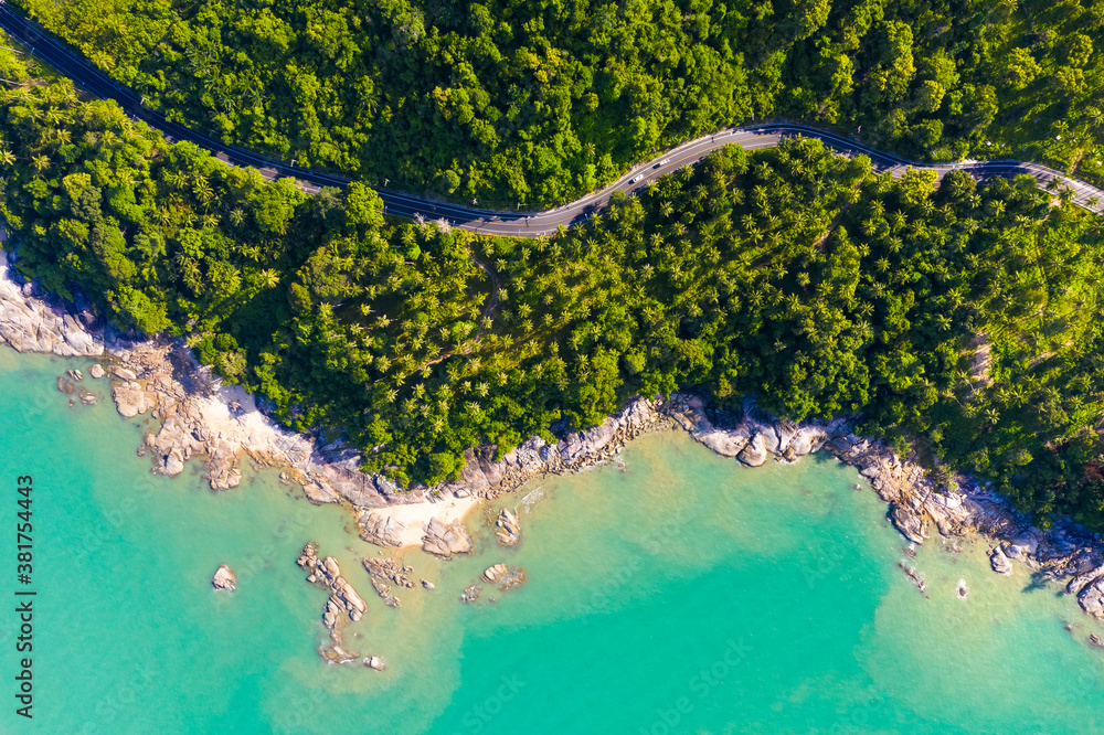 High angle view of  road pass through coconut tree forest and beautiful coastline in Khanom, Nakhon 