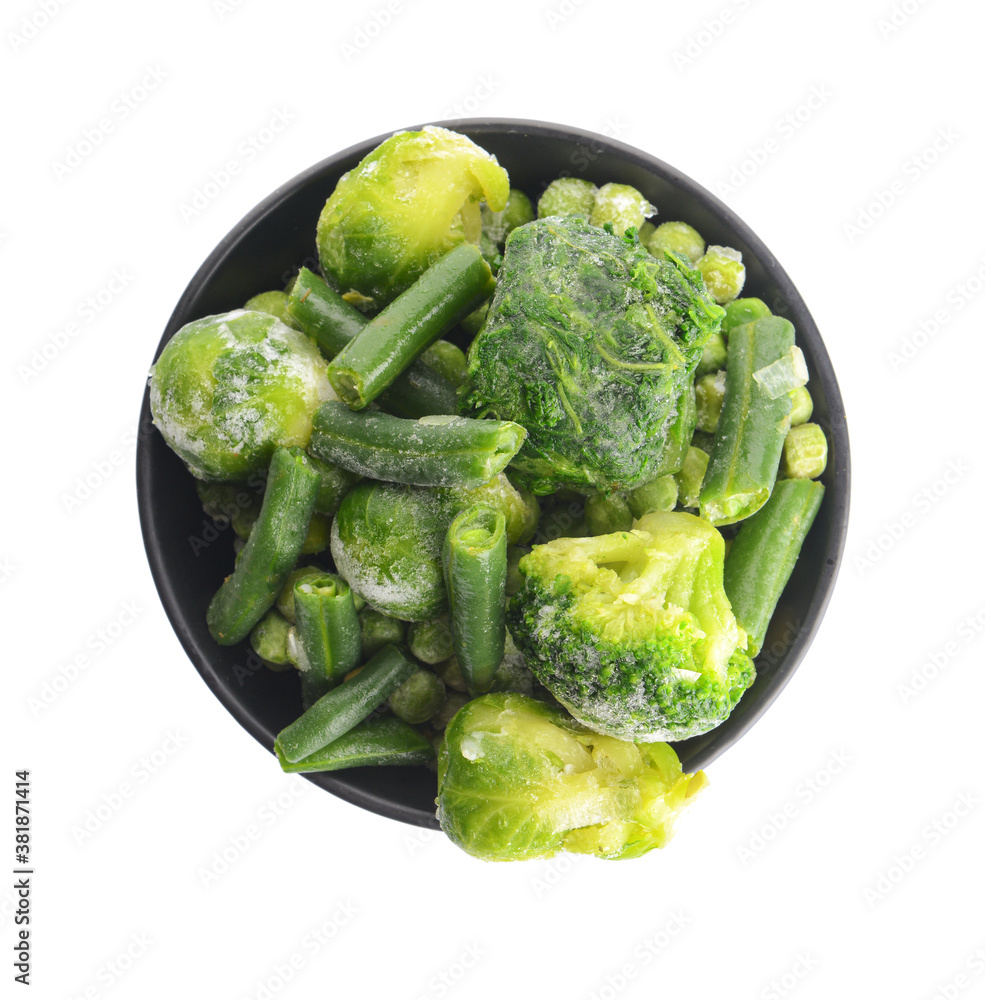 Mix of frozen vegetables in bowl on white background