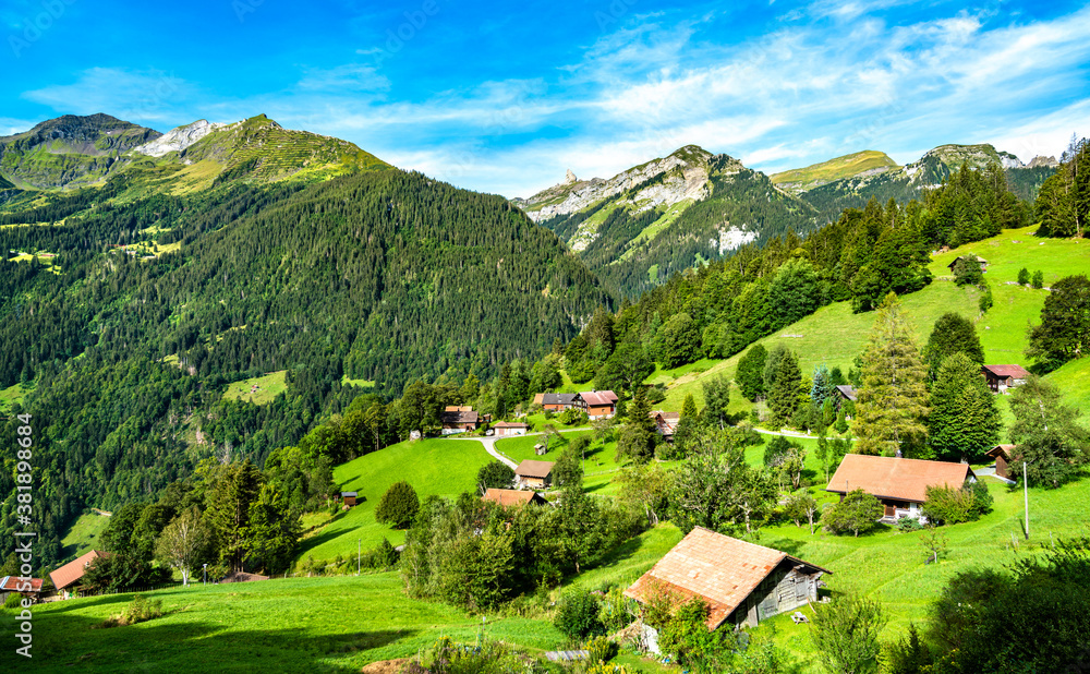 Traditional wooden houses in the mountain village of Wengen, Switzerland