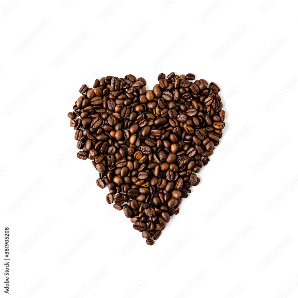 Coffee beans in shape of heart on white background, flat lay