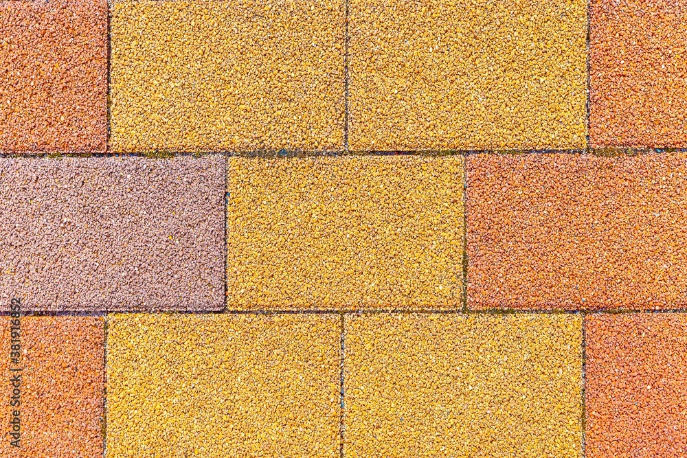 Vintage yellow cobblestone pavement pattern and background