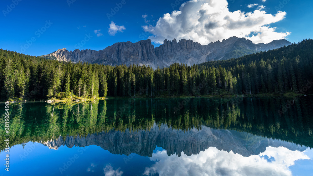 Carezza lake, Mount Latemar, Bolzano province, South tyrol, Italy. Landscape of Lake Carezza or Kare