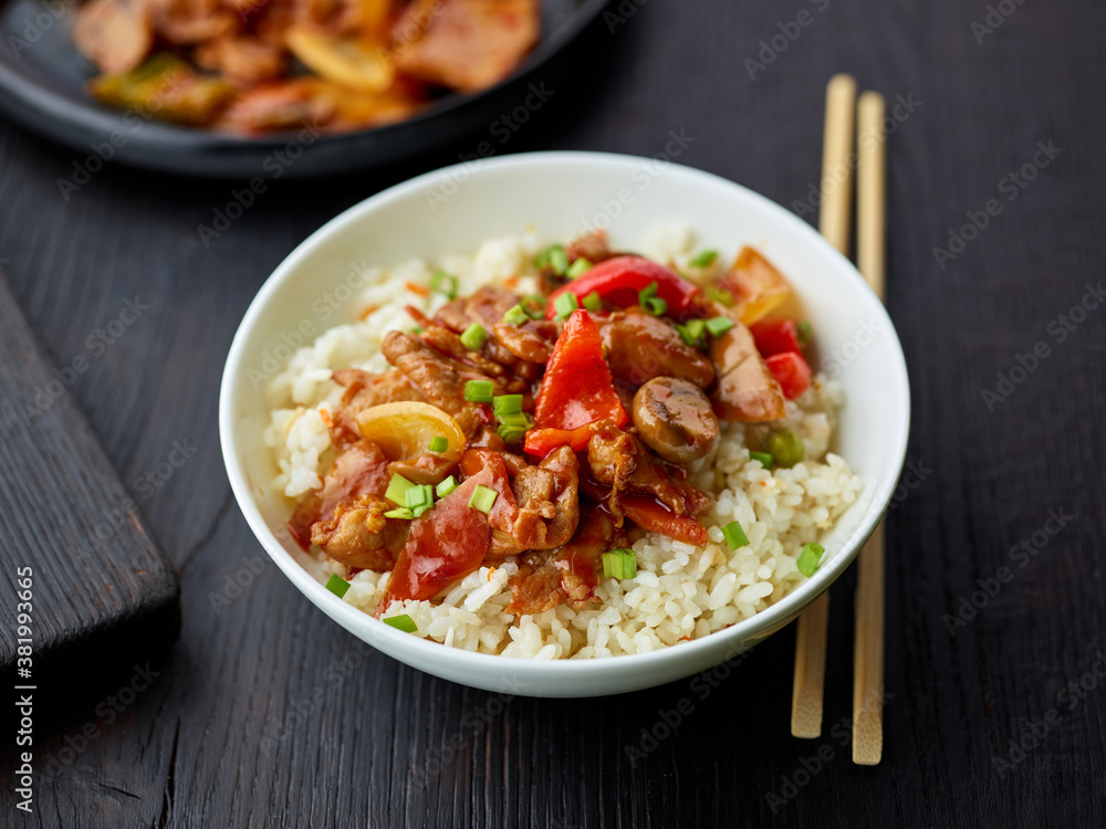 fried rice and vegetables with hot chicken sauce