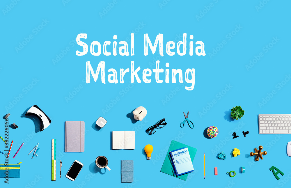 Social media marketing with collection of electronic gadgets and office supplies