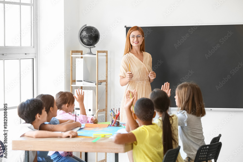 Teacher conducting lesson in classroom