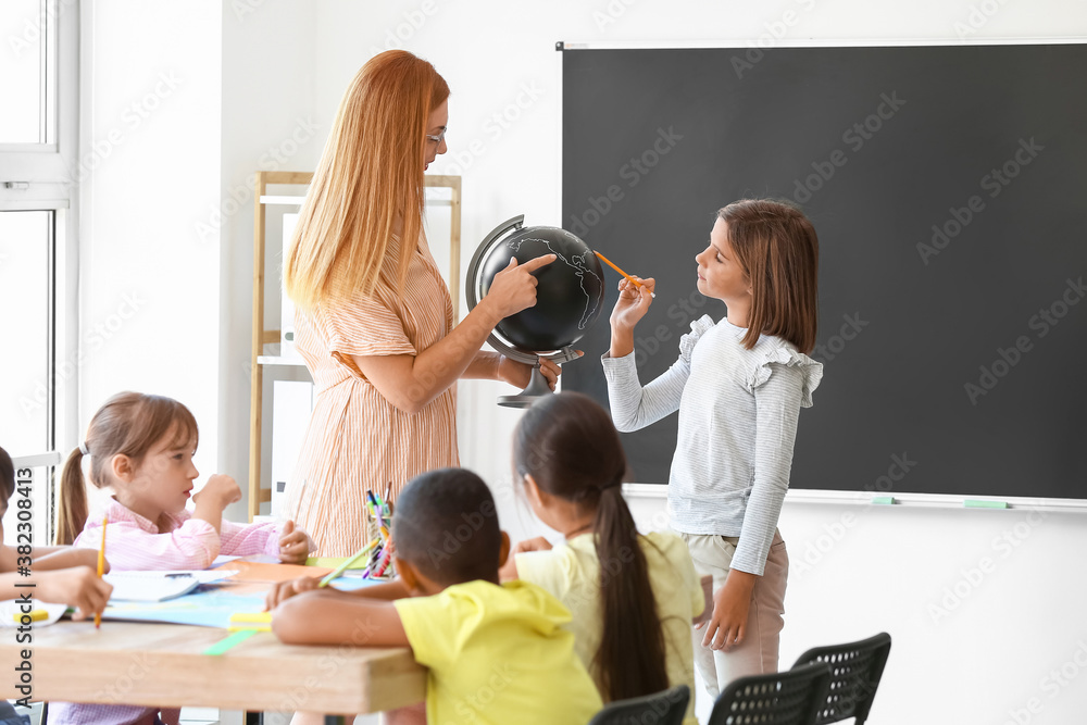 Teacher conducting lesson in classroom