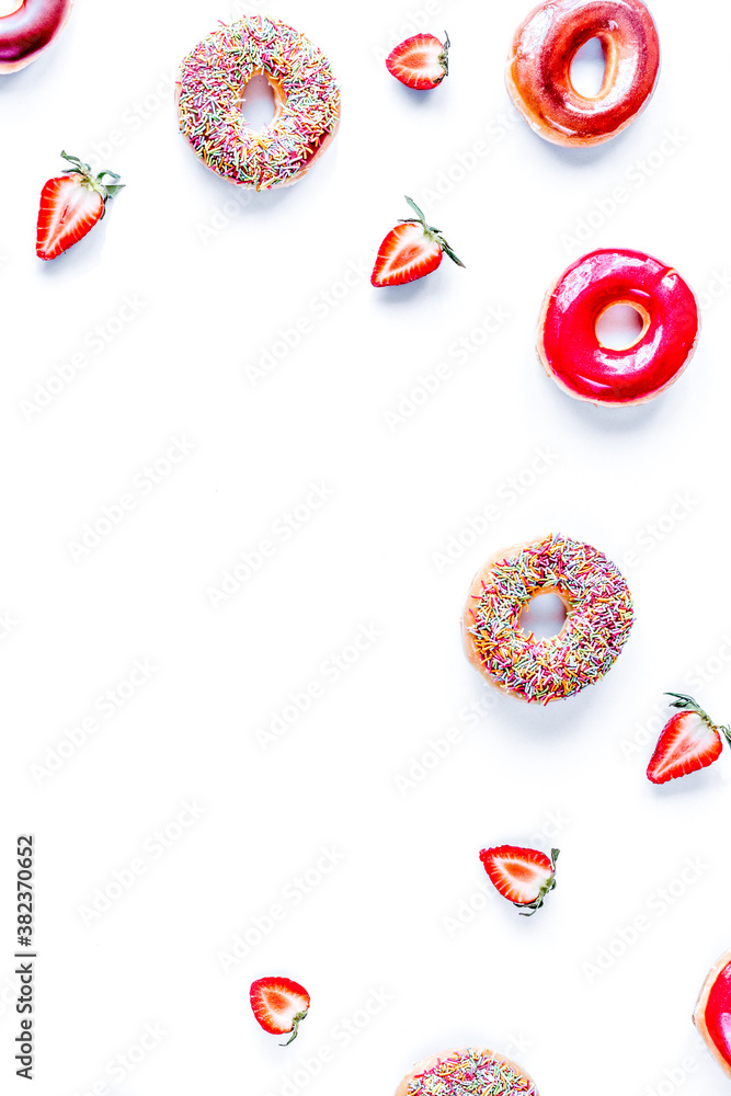 lunch with donuts and strawberry on white background top view mock up