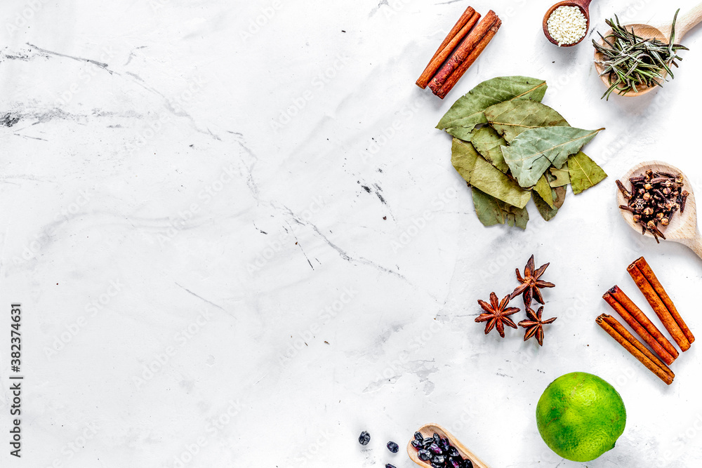 Cooking with spices, vanilla, cinnamon on kitchen table background top view mock-up