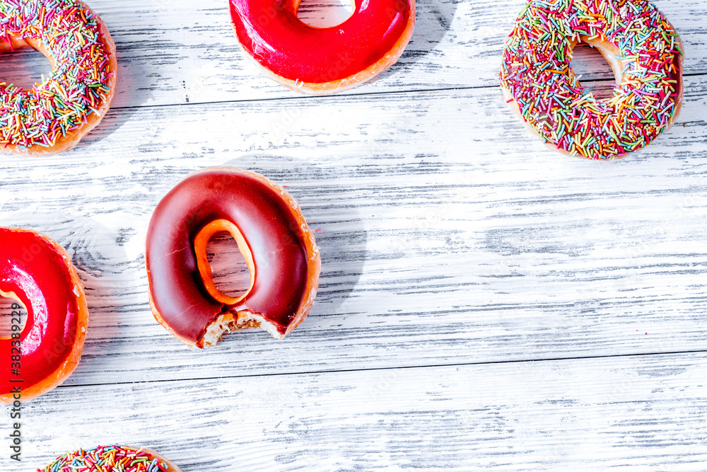 lunch with donuts on wooden table background top view mock up