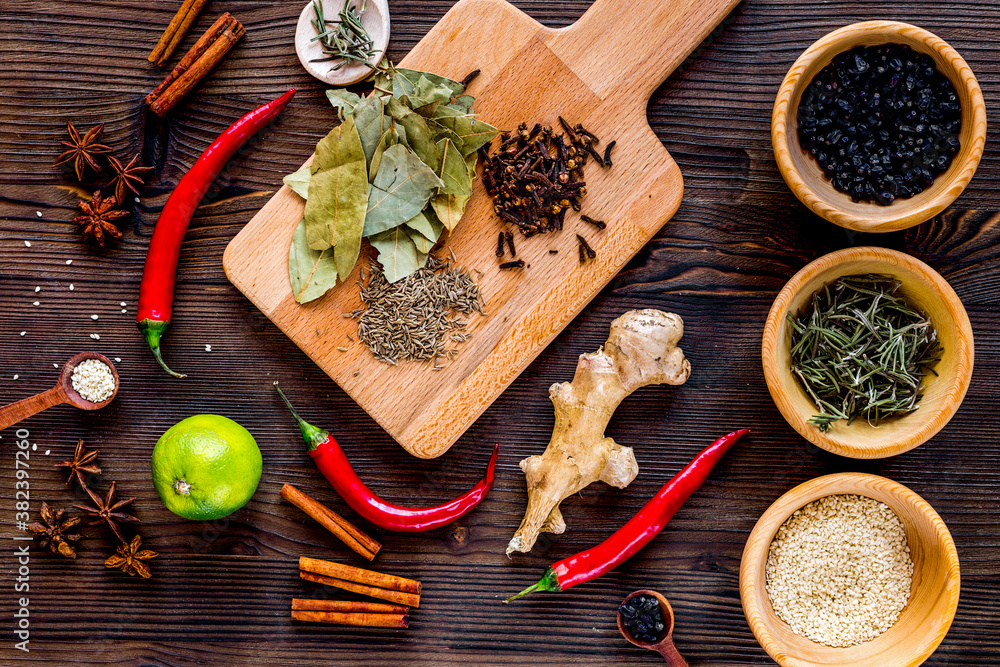 Flat lay herb and spices on rustic kitchen background