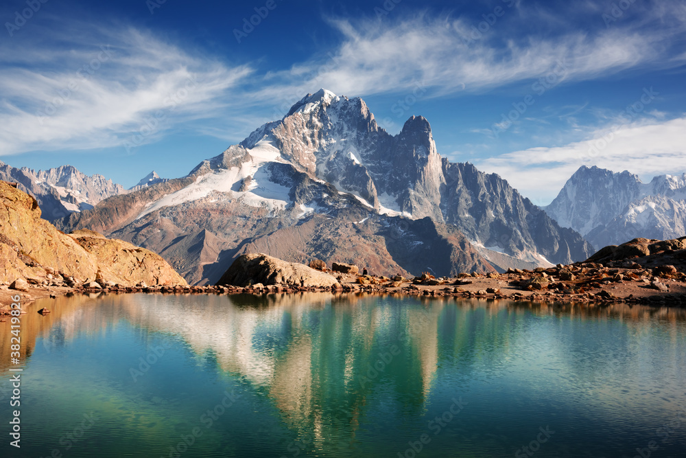 Incredible view of clear water and sky reflection on Lac Blanc lake in France Alps. Monte Bianco mou