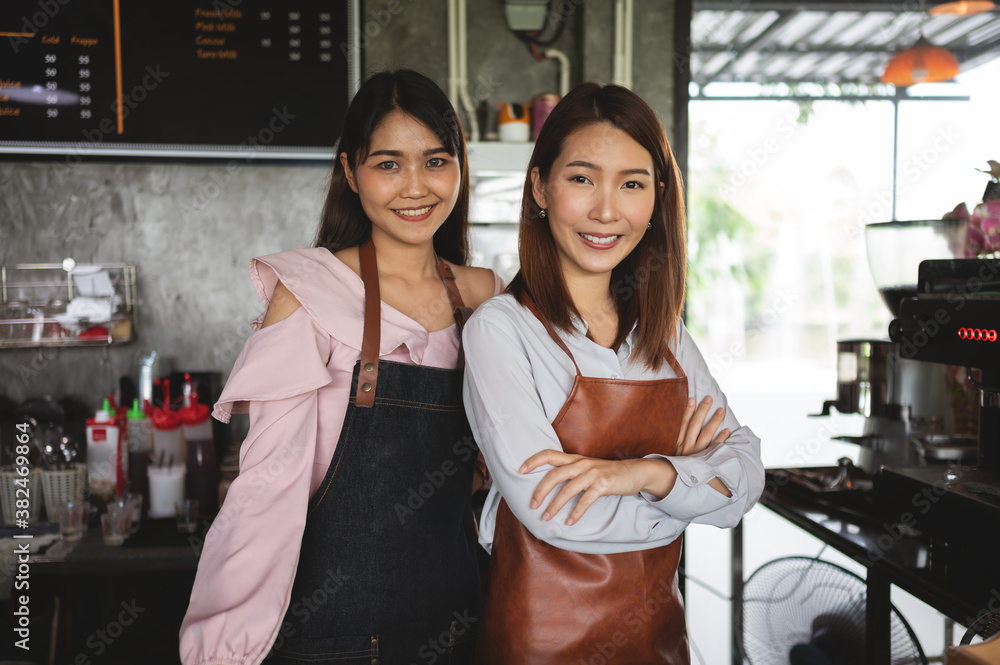 Startup new business concept. Portrait of young Asian adult opened new coffee shop as business partn