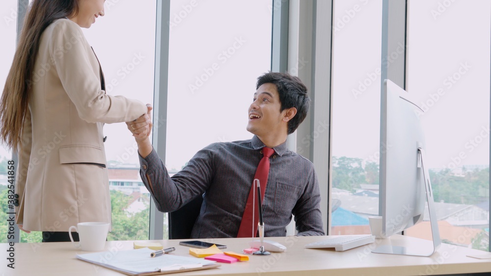 Two business people talk project strategy at office meeting room. Businessman discuss project planni