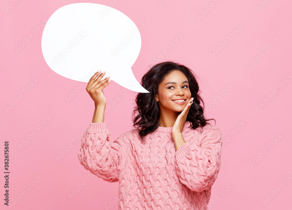 Delighted ethnic woman with speech bubble.