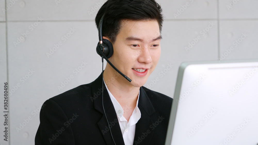 Business people wearing headset working in office to support remote customer or colleague. Call cent