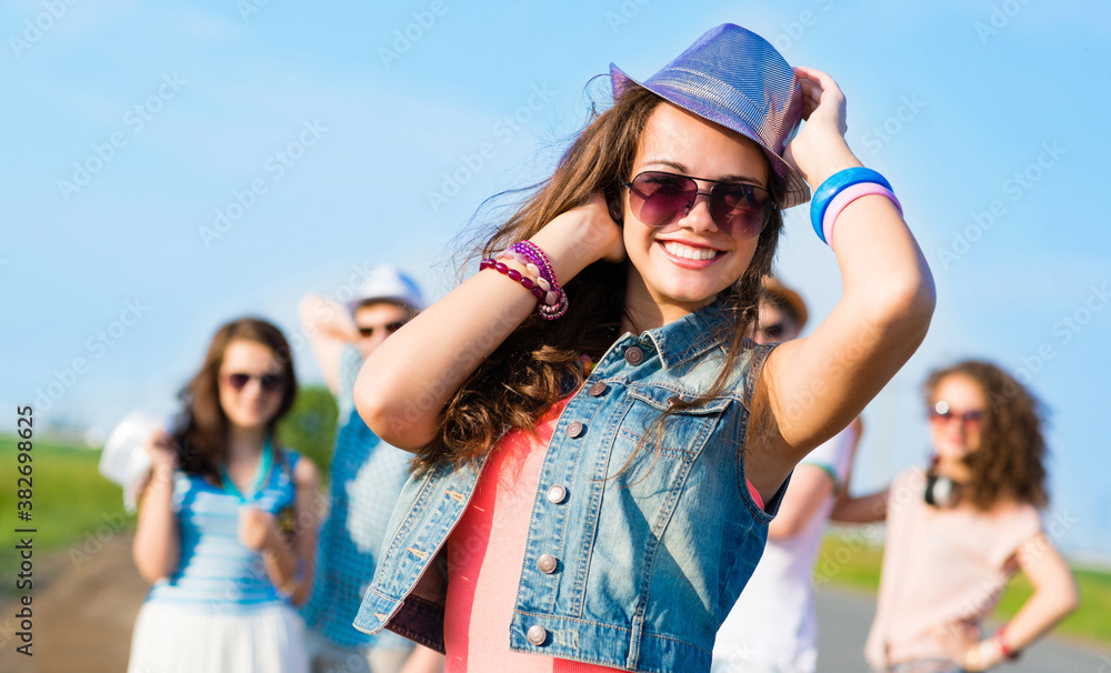 stylish young woman in sunglasses