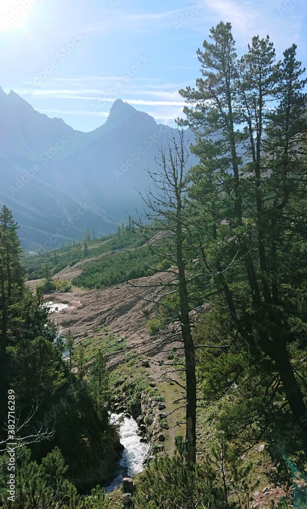 Summer landscape in the dolomite alps of italy. Blue sky I am the bright sun