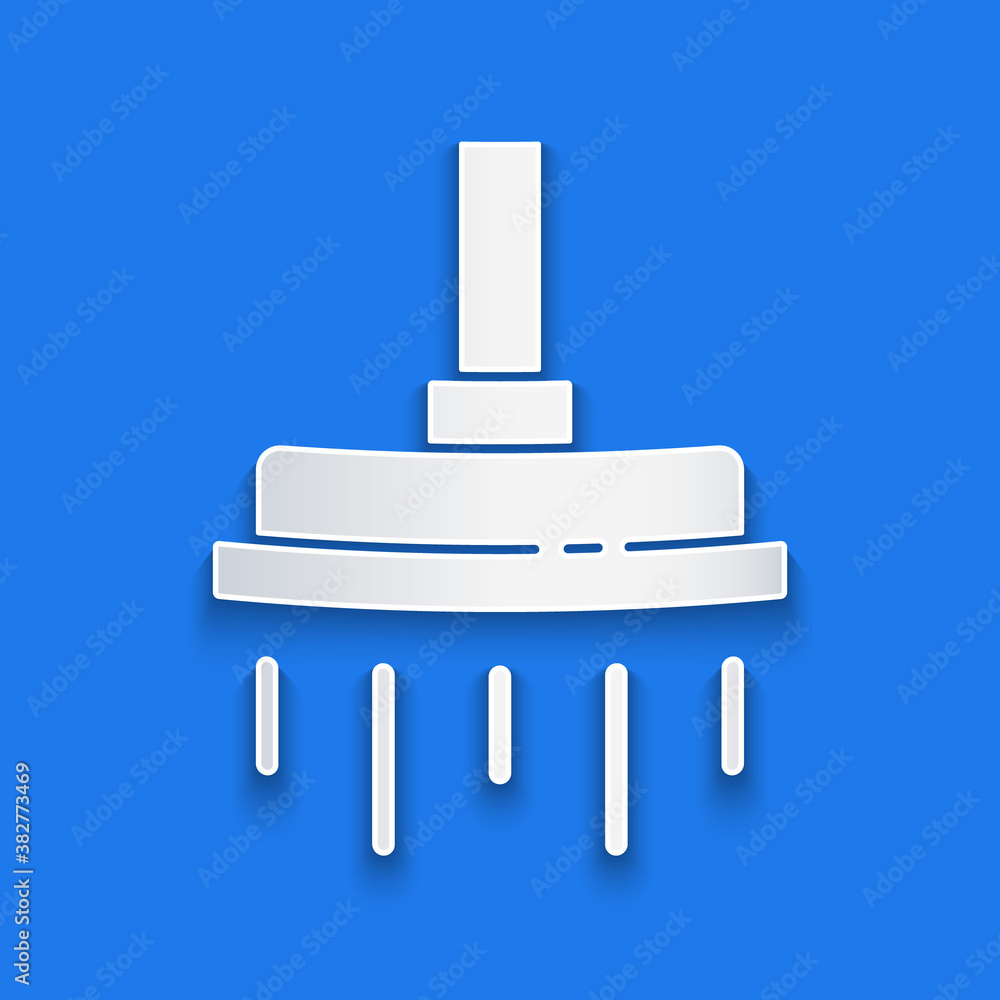 Paper cut Shower head with water drops flowing icon isolated on blue background. Paper art style. Ve