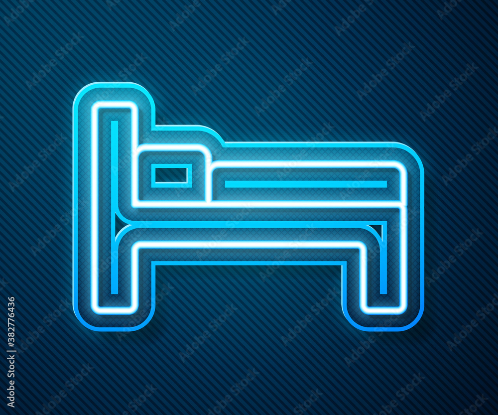 Glowing neon line Bed icon isolated on blue background. Vector Illustration.