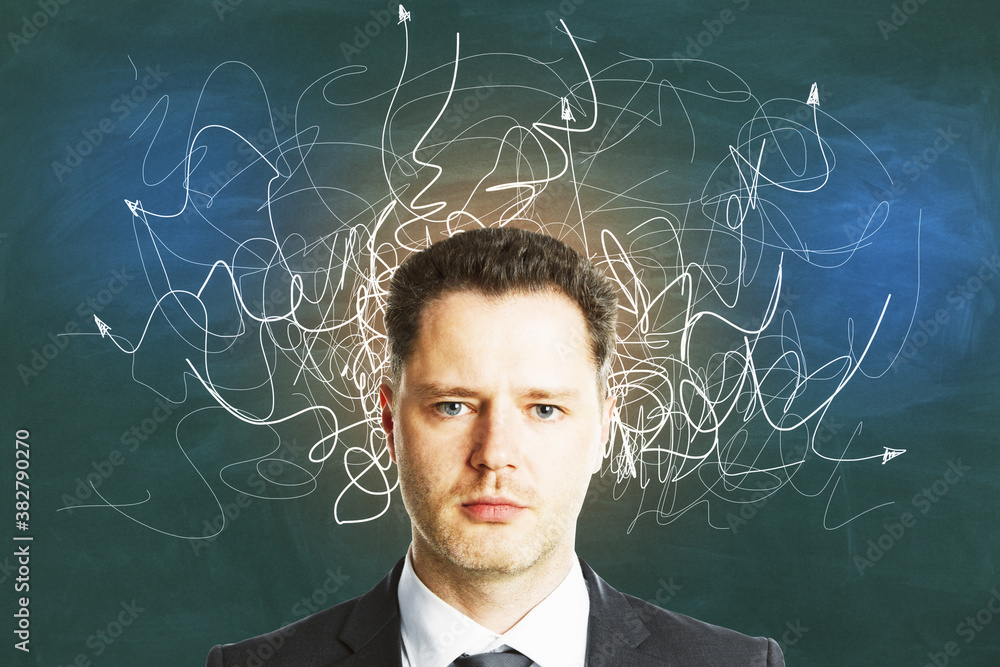 Businessman with drawing arrows over head