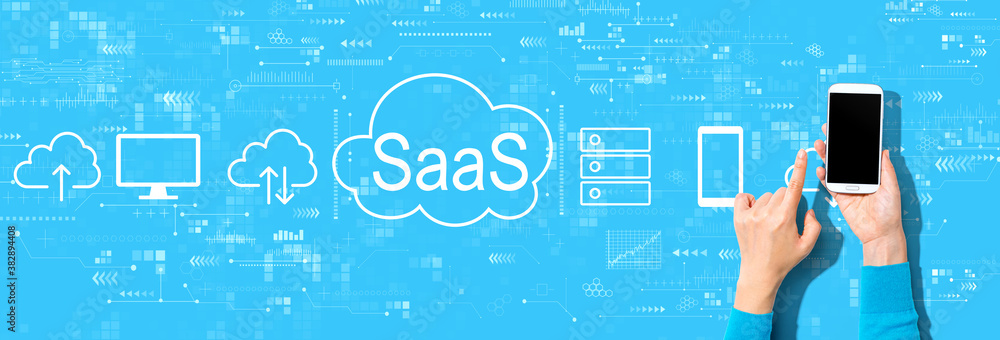 SaaS - software as a service concept with person using a smartphone on a blue background