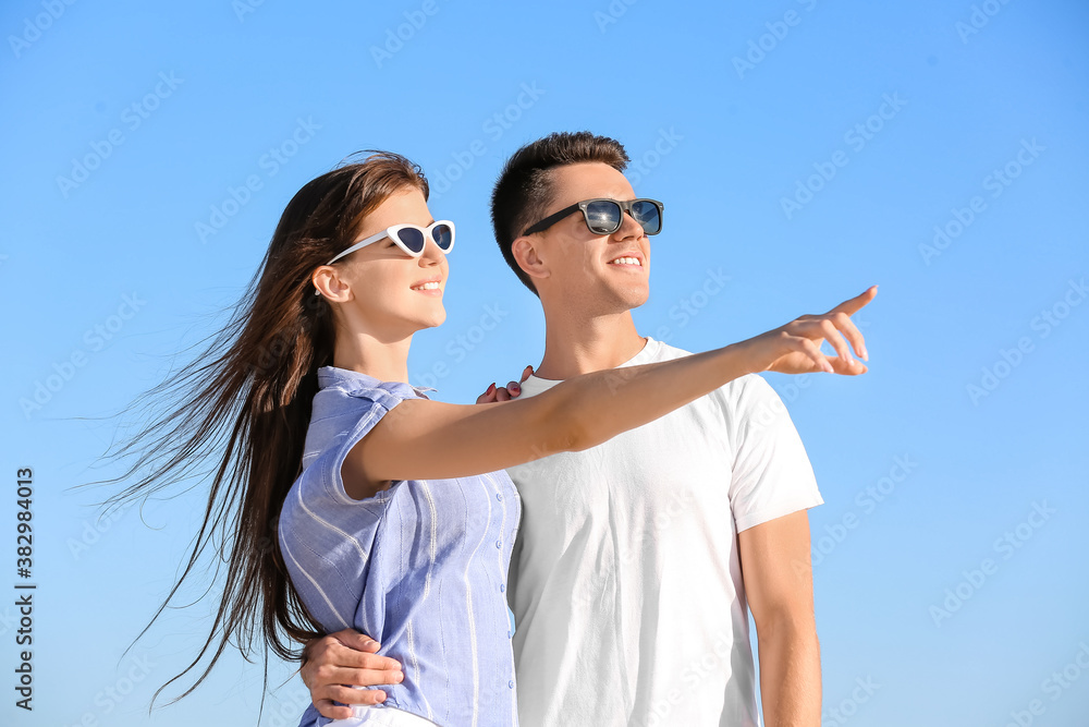 Happy young couple on sea beach