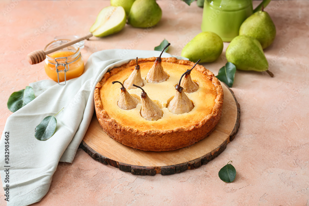 Tasty pear cake on color background