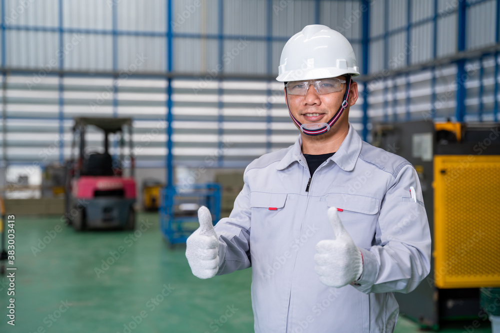 Portrait of manual asian man worker is standing show confidence with confident with working suite dr