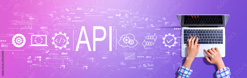 API - application programming interface concept with woman using a laptop computer