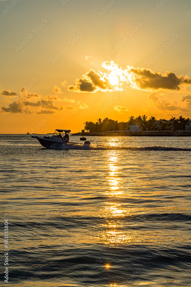 Sunset, view of Sunset y Island from Mallory Square, Key West, Florida, US