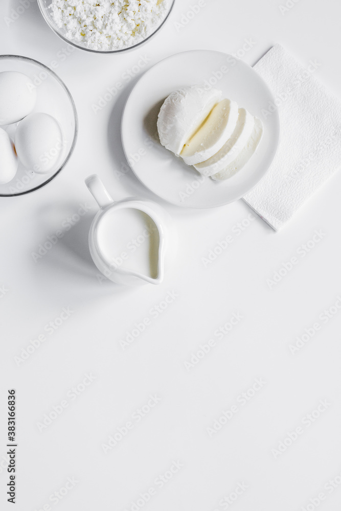 Healthy food concept with milk on white table top view mock-up