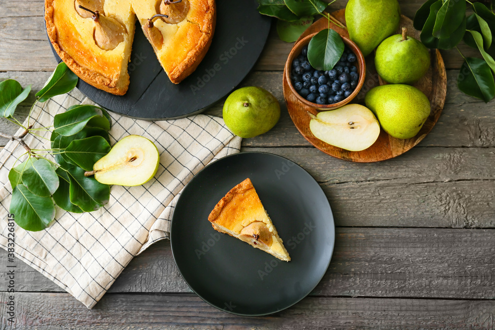 Tasty pear cake on wooden background