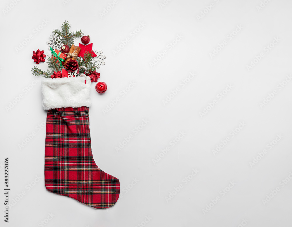 Christmas sock with decor on white background