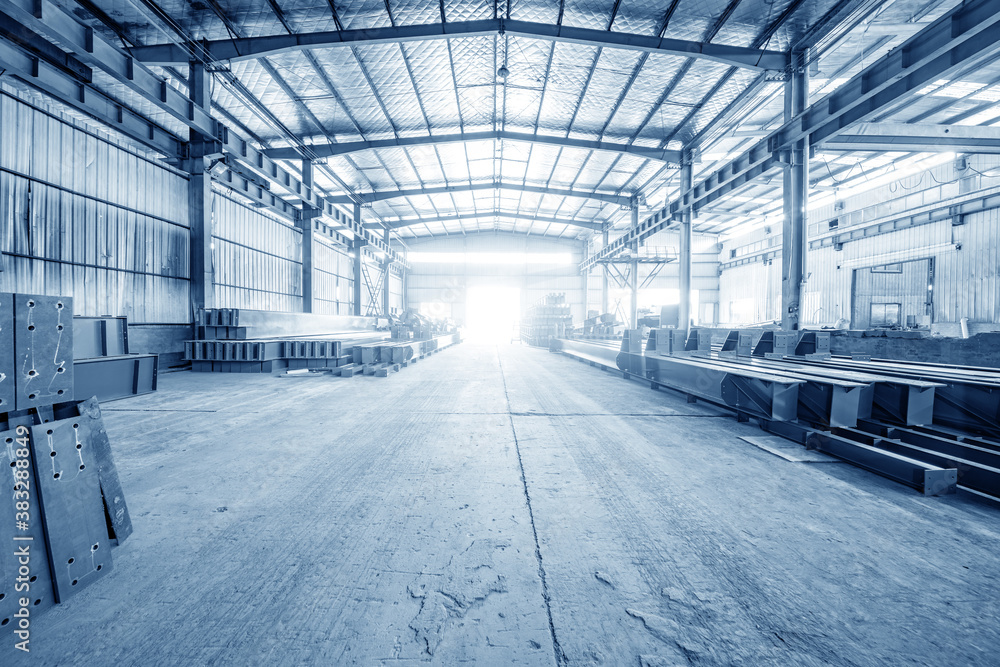 Steel factory floor, stacked with a lot of steel